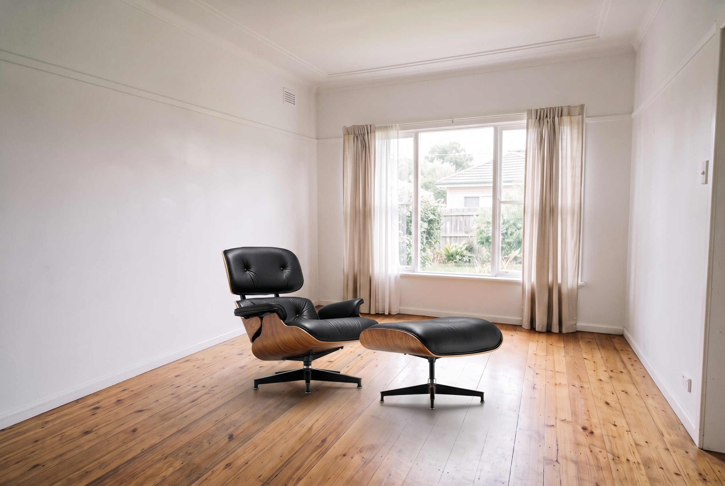 The same living room visualised with the Eames Lounge Chair